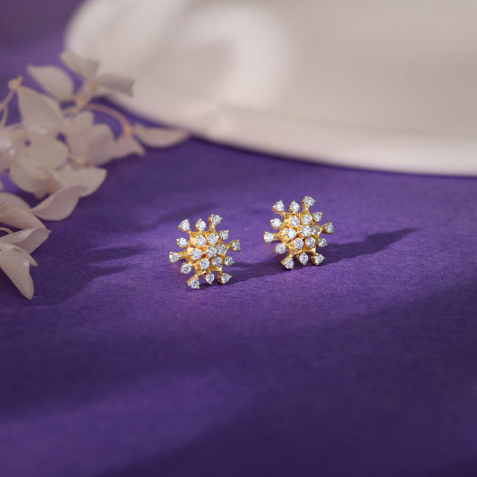 Gold flower earrings with lab-grown diamonds for an elegant touch.