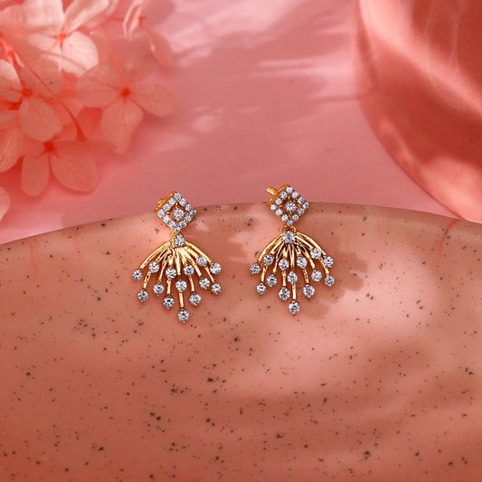 Gold double-drop earrings with sparkling stones.
