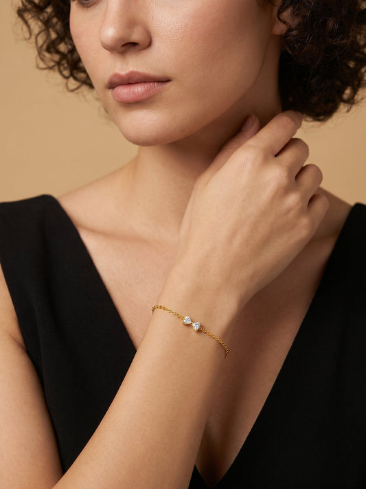 IXIA by GIVA Bow Energy Gold Plated Charm Bracelet