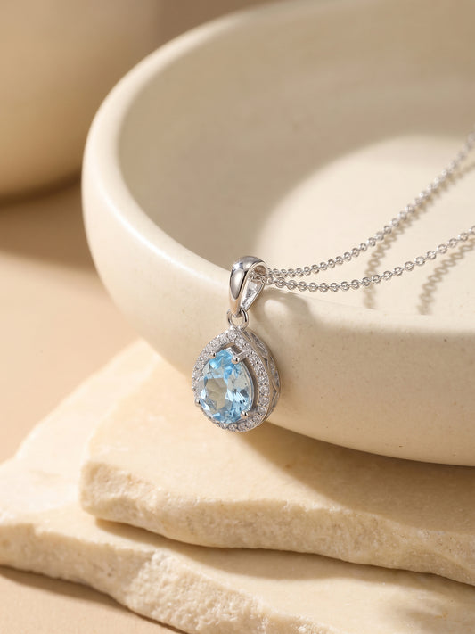 Silver Blue Topaz Pendant With Link Chain