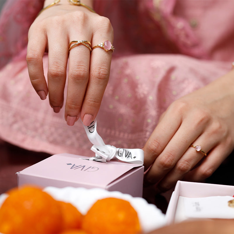 Express your emotions with a gold/silver rakhi gift this Raksha Bandhan