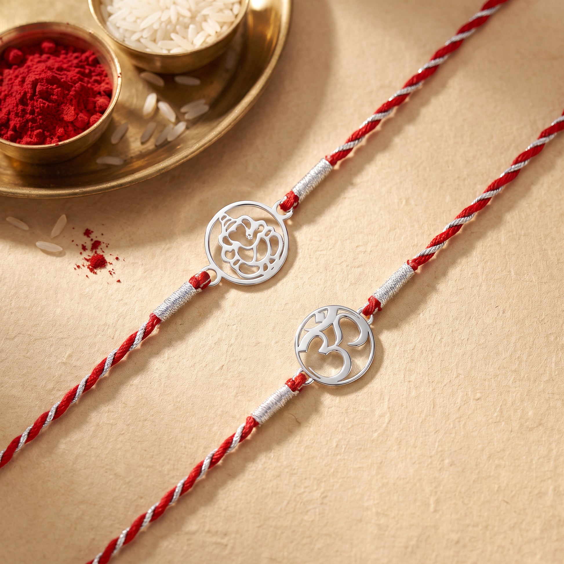 Silver Om & Ganesha Rakhi Combo (Set of 2)