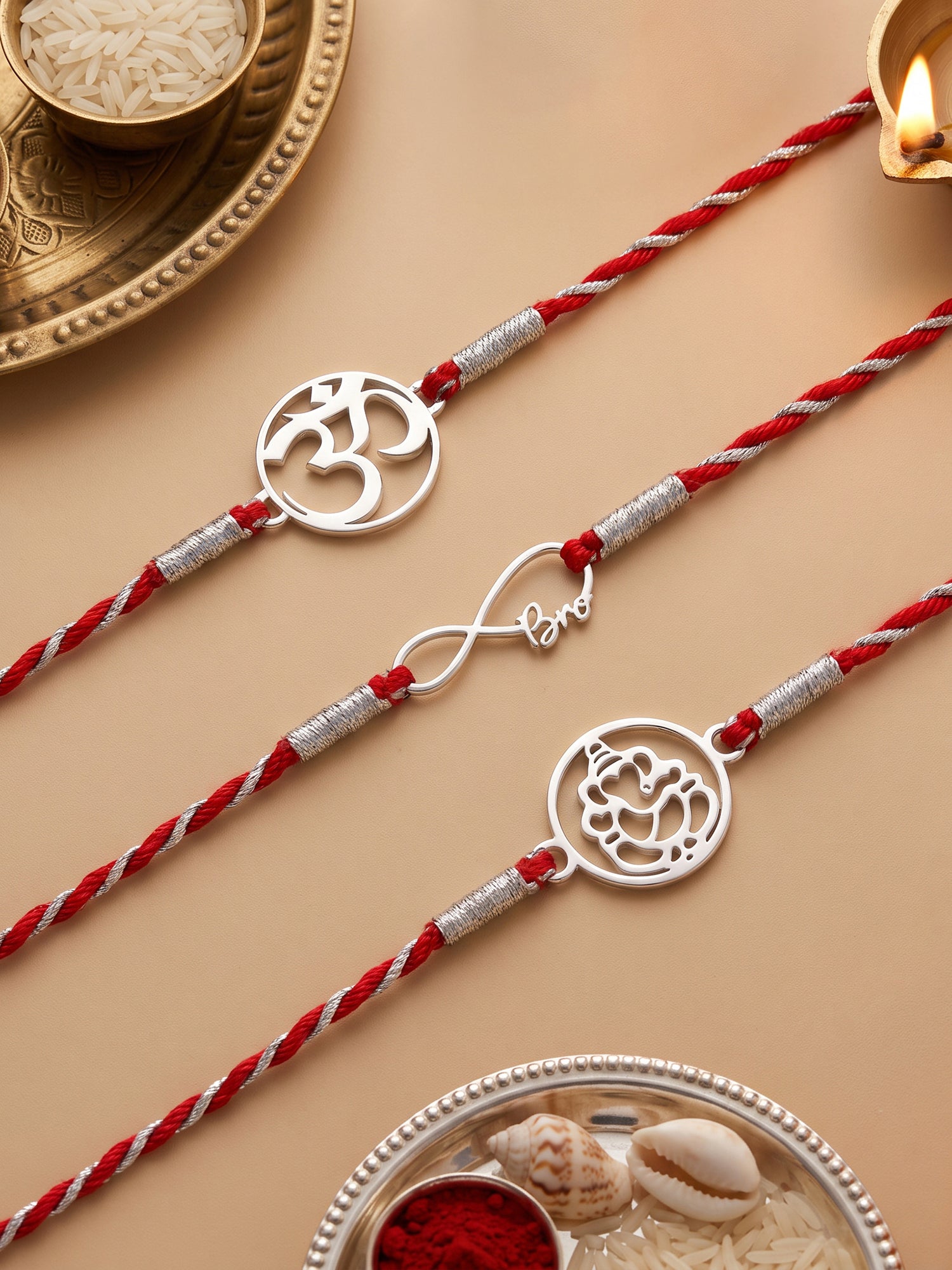 Silver Infinite Ganapati Rakhi Combo (Set of 3)