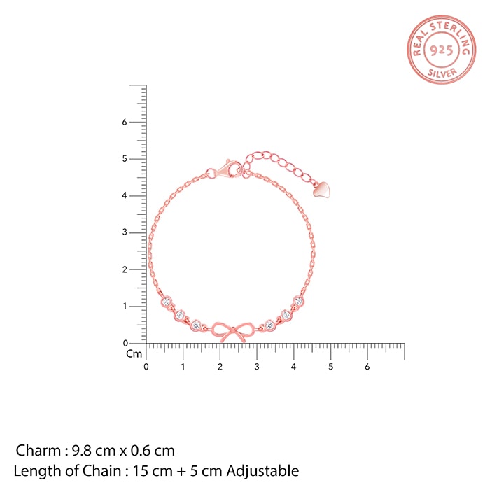 Rose gold bow bracelet with zircon-studded circles on each side






