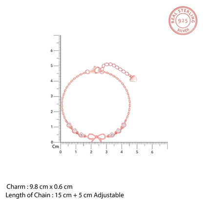 Rose gold bow bracelet with zircon-studded circles on each side






