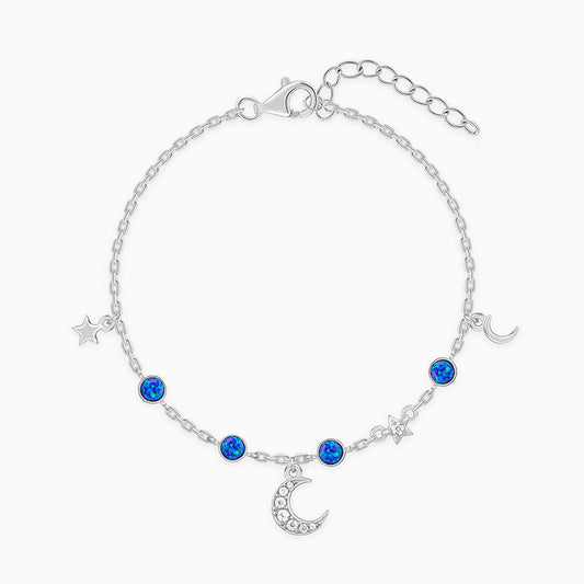 Silver celestial bracelet with opal stones and zircon-studded charms