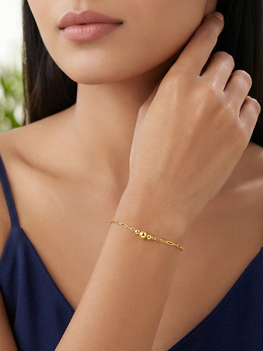 Kriti Sanon Golden Glowing Beads Bracelet