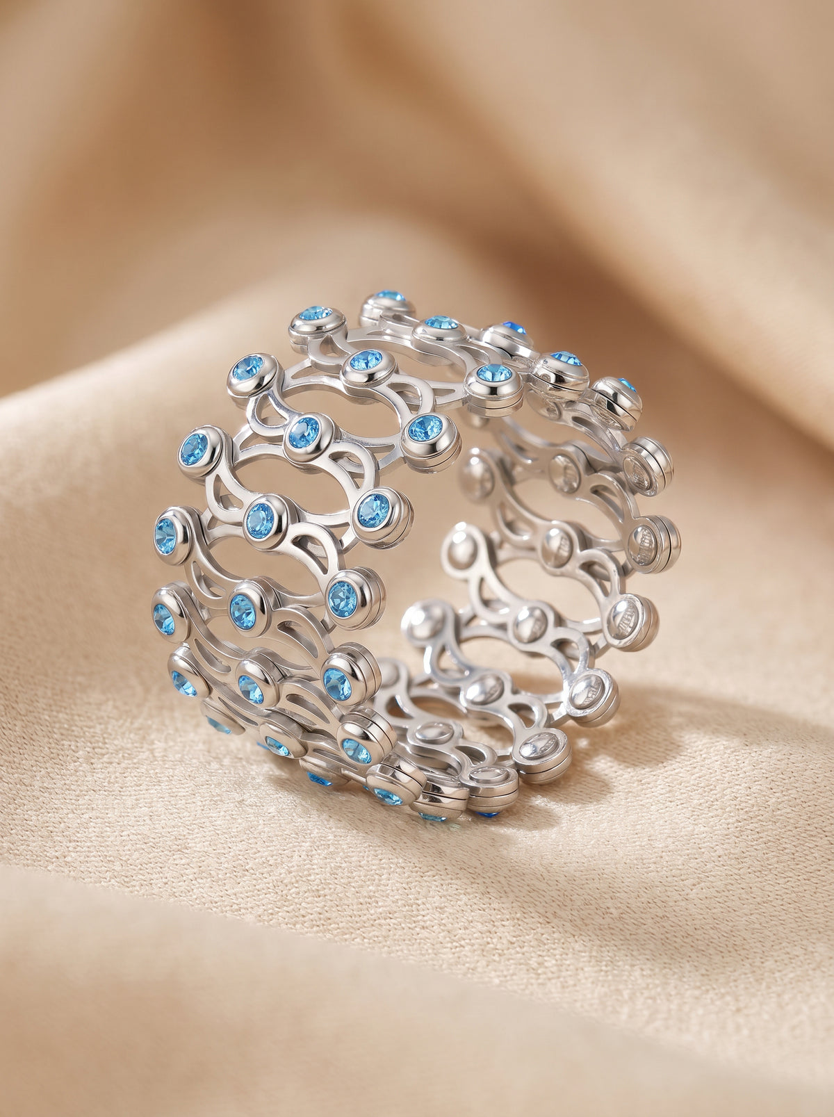 Silver Supple Bracelet with Aqua Blue Stones