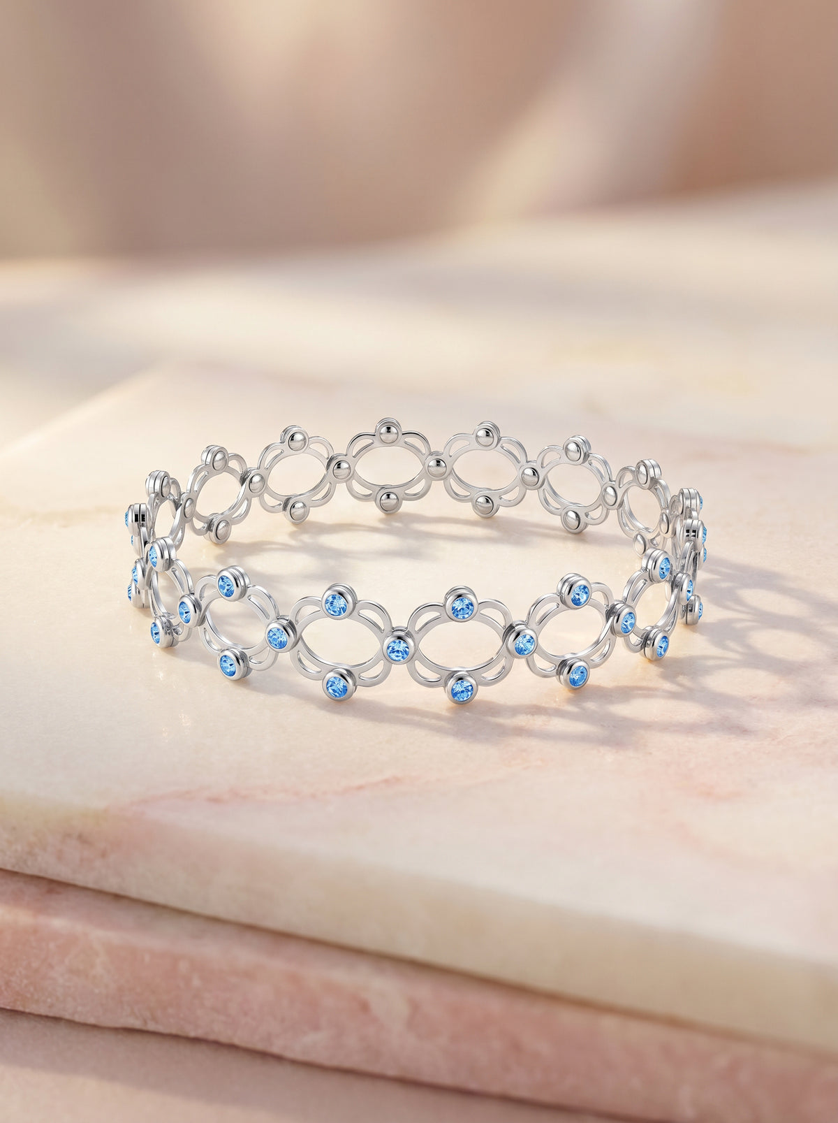 Silver Supple Bracelet with Aqua Blue Stones