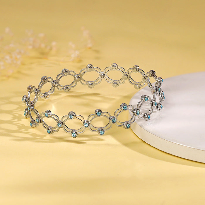 Silver Supple Bracelet with Aqua Blue Stones - Image 1