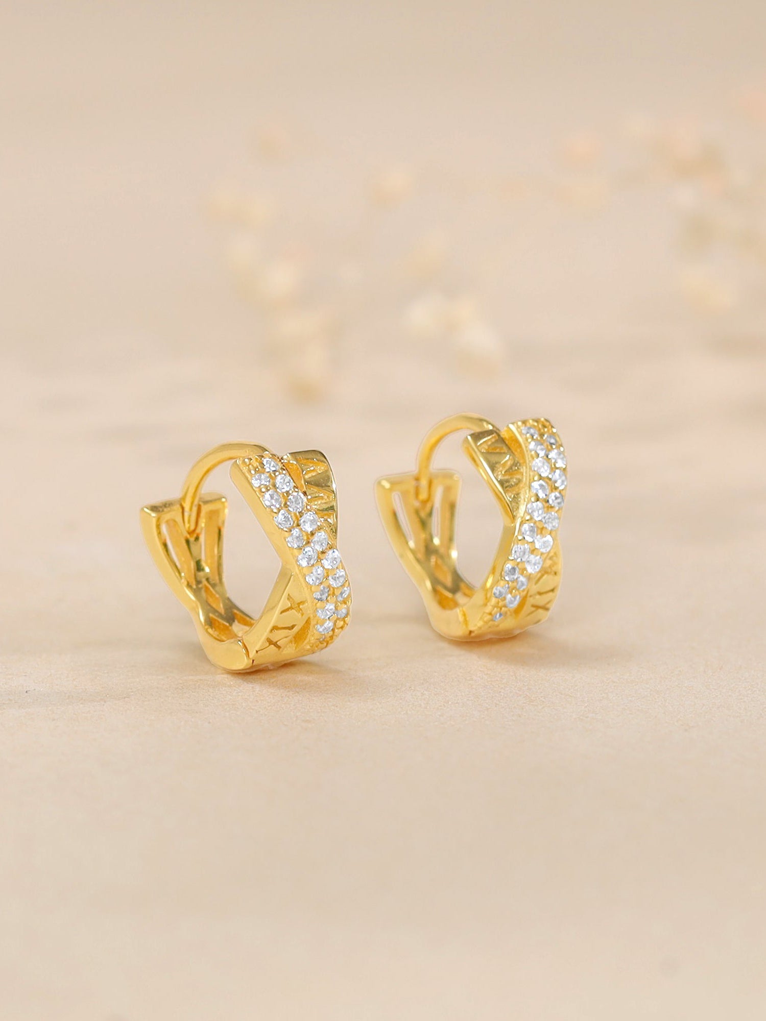 Golden Zircon Studded Twisted Huggies Earrings