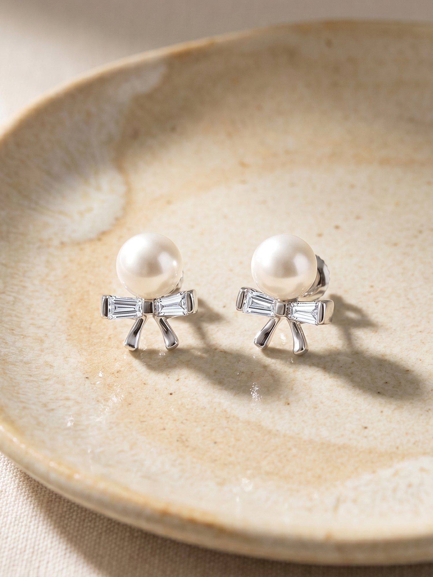 Silver Pearl Bownot Stud Earrings
