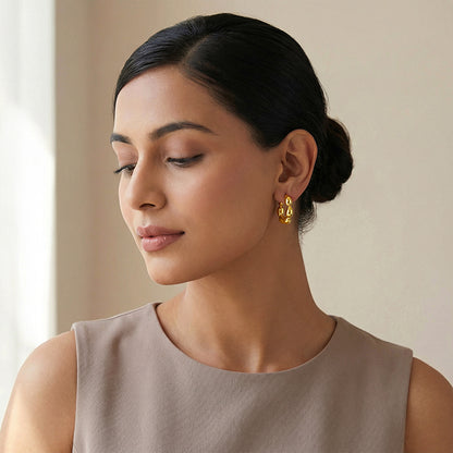 Golden Graceful Twist Hoop Earrings