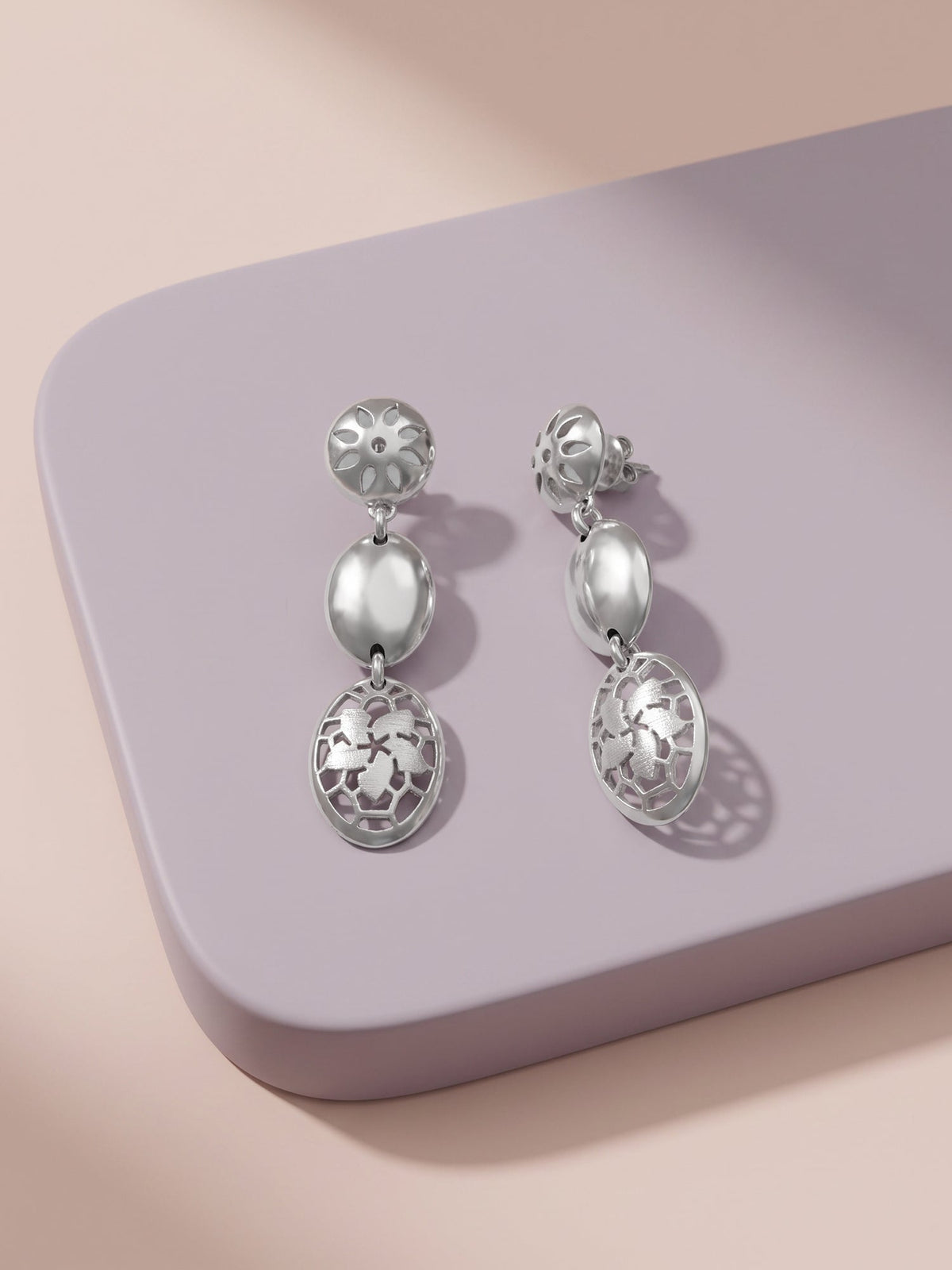 Silver Oval Motion Dangler Earrings