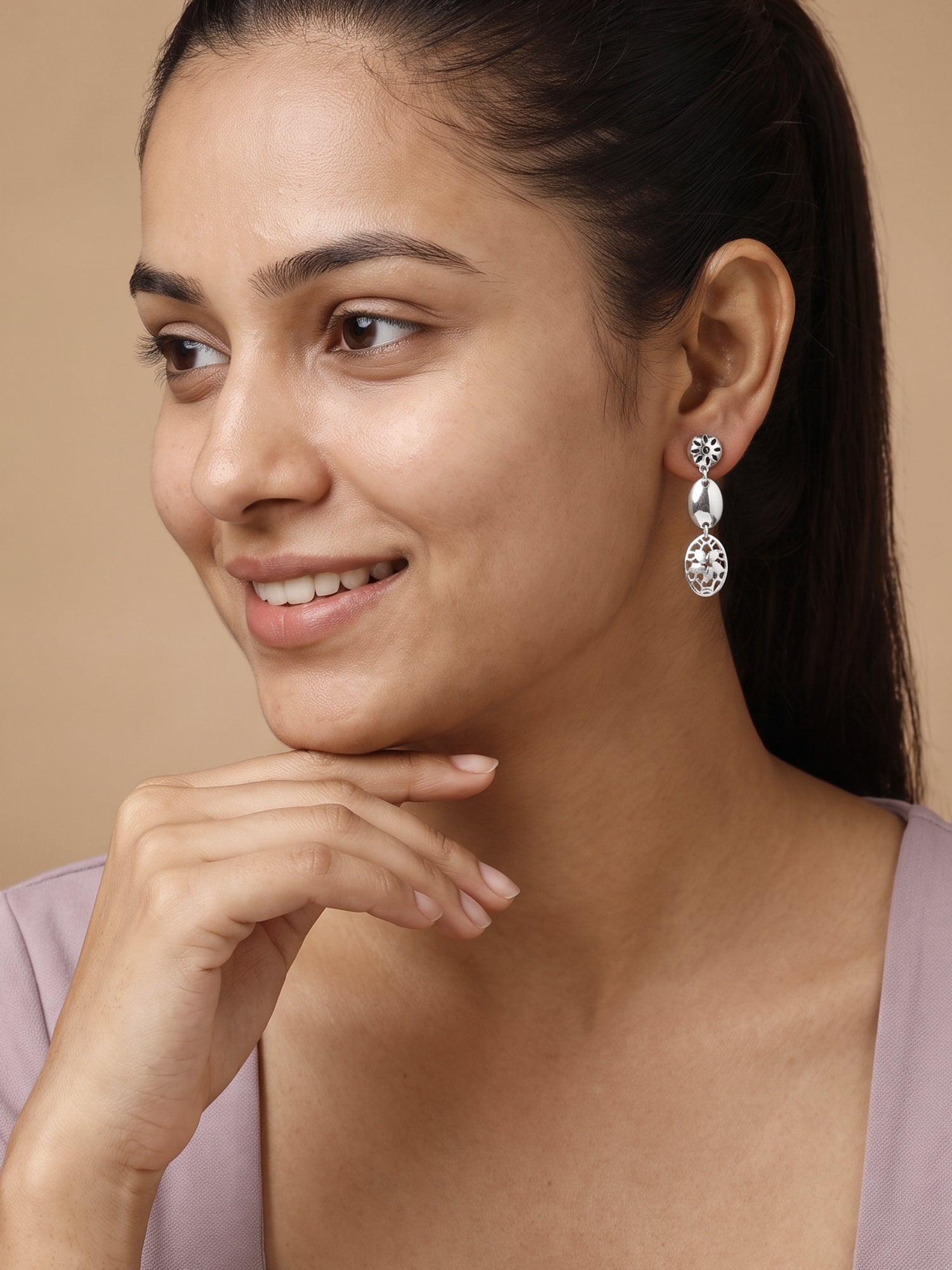 Silver Oval Motion Dangler Earrings