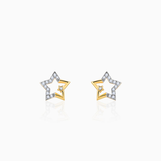 Pure gold star-shaped earrings with lab-grown diamonds.