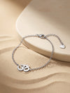 IXIA by GIVA Om Rhodium Plated Rakhi Bracelet