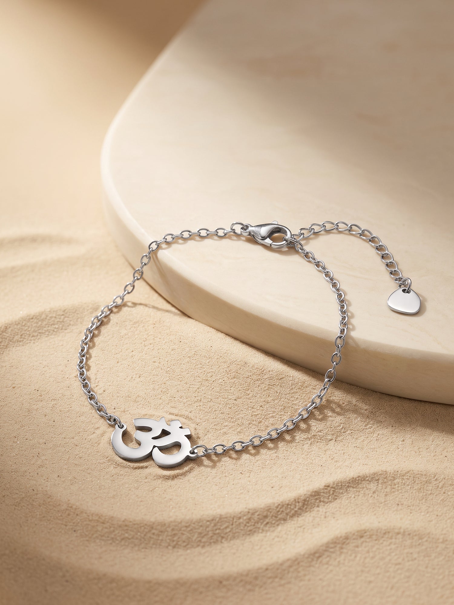 IXIA by GIVA Om Rhodium Plated Rakhi Bracelet
