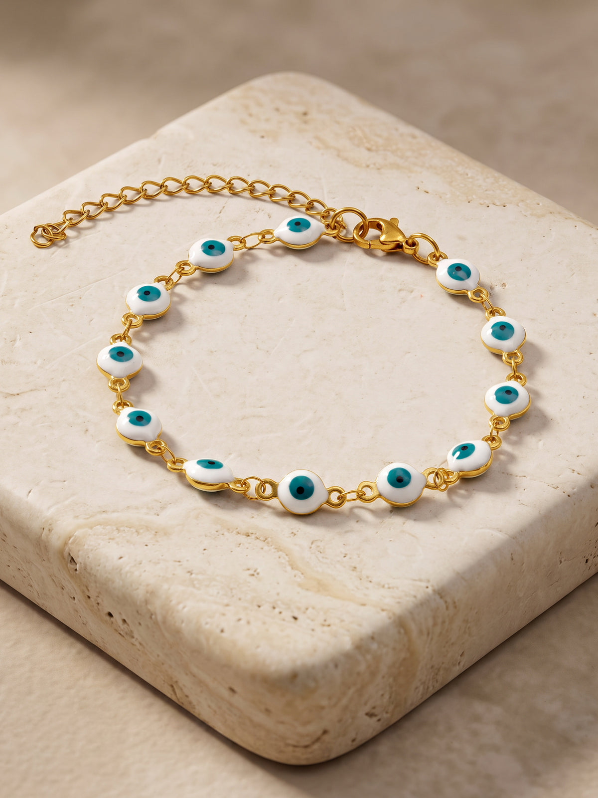 IXIA by GIVA White Evil Eye Gold Plated Rakhi Bracelet