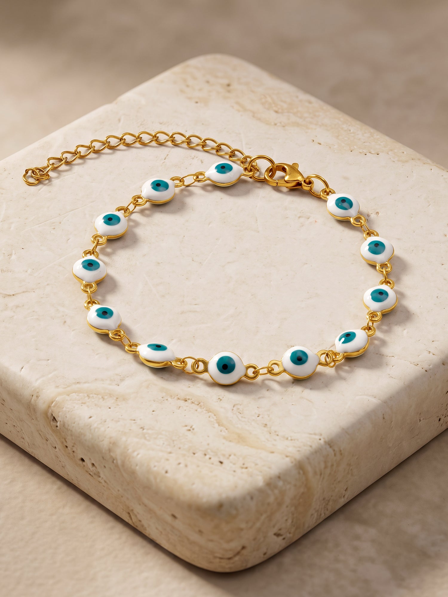 OnnMe by GIVA White Evil Eye Gold Plated Rakhi Bracelet