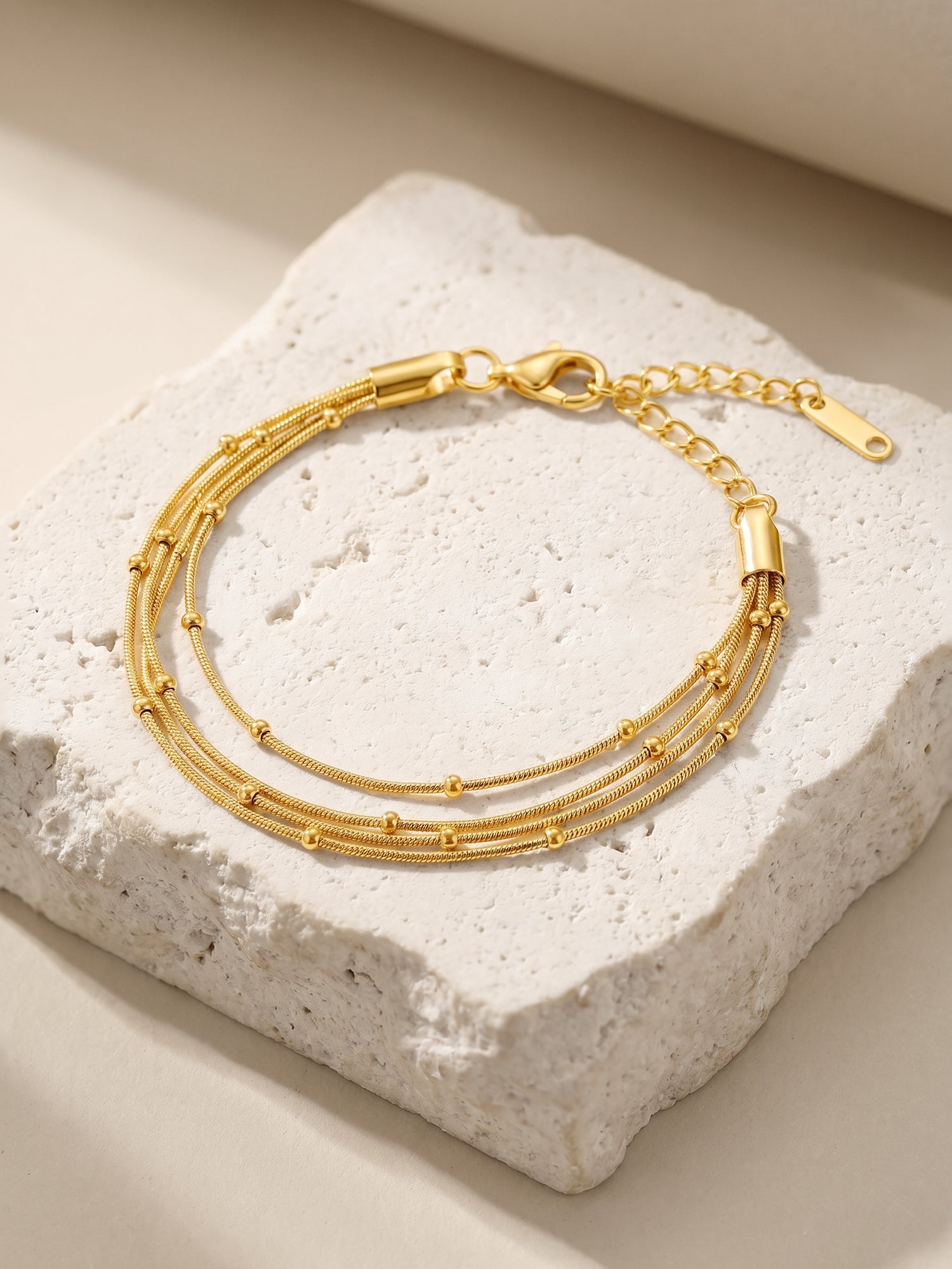 IXIA by GIVA Twist Script Gold Plated Bracelet