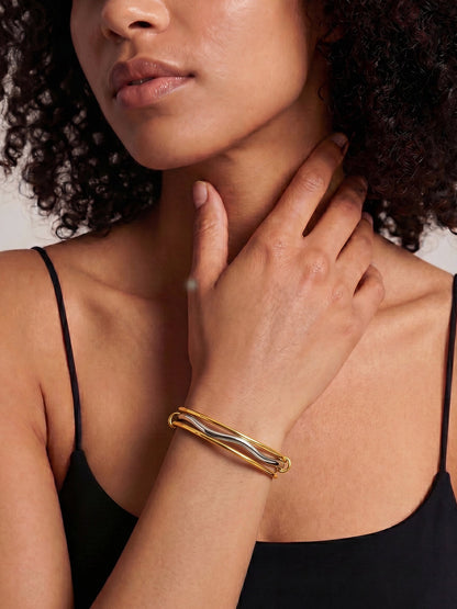 Twisted Signal Dual Tone Bangle Bracelet
