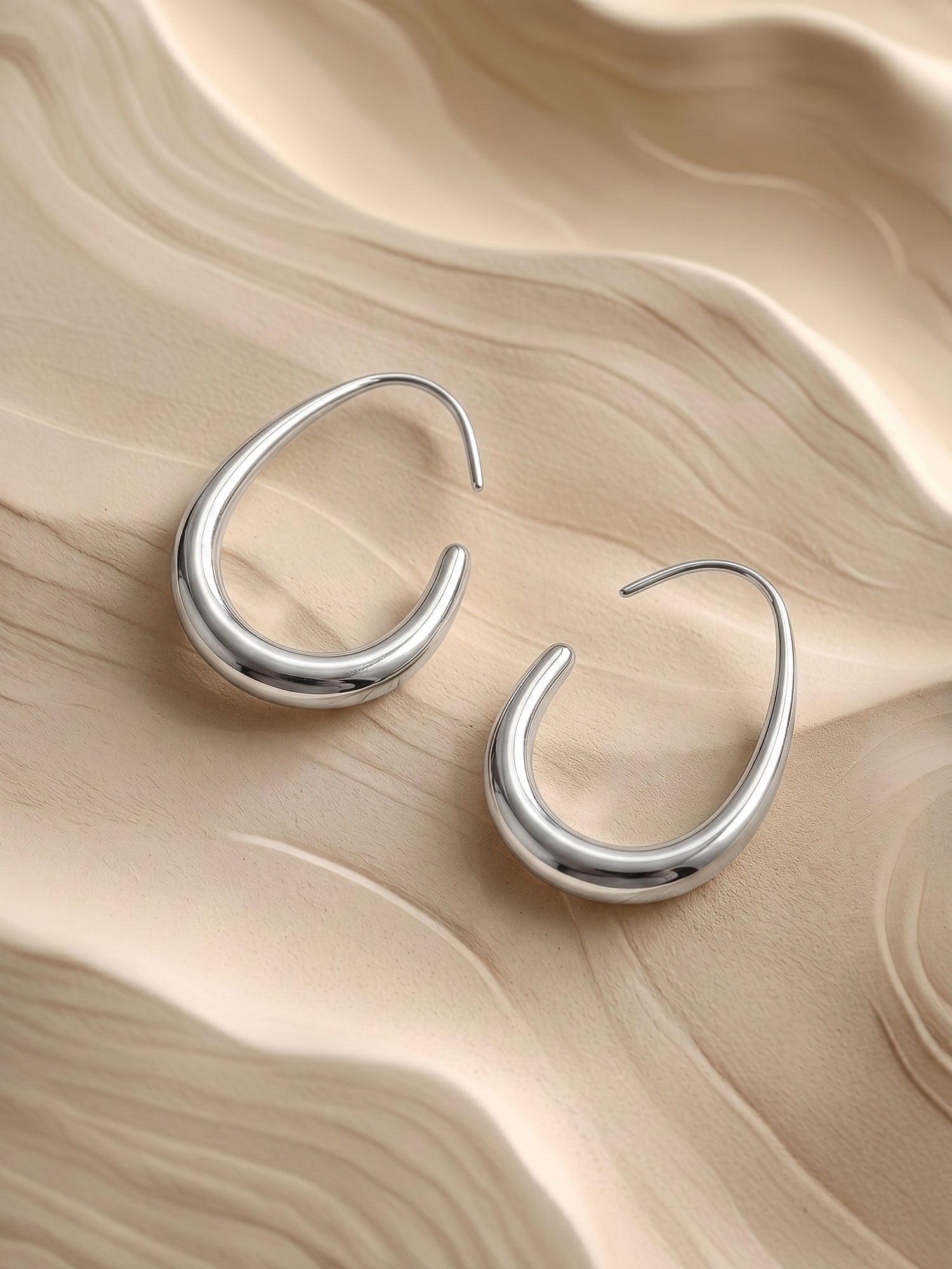 Bare Curve Rhodium Plated Earrings