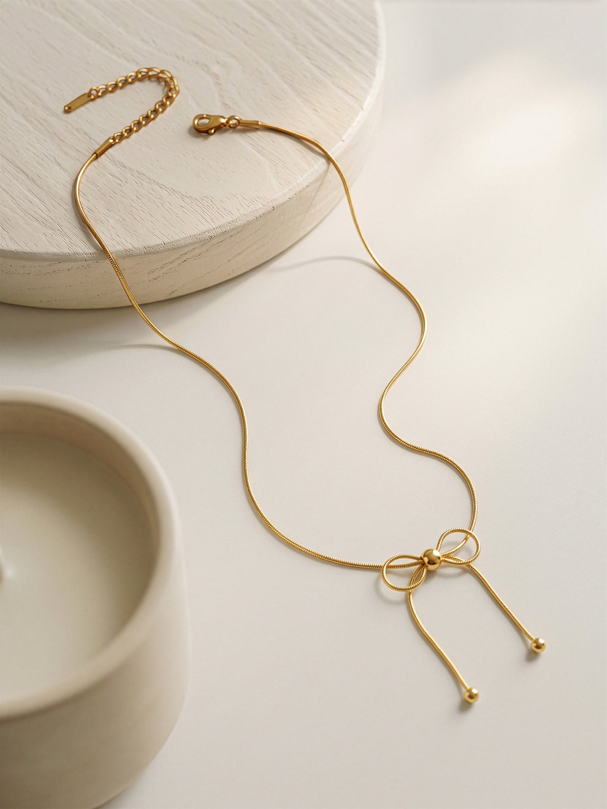 IXIA by GIVA Tie Me Knot Gold Plated Necklace