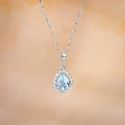 Silver Blue Topaz Pendant With Link Chain
