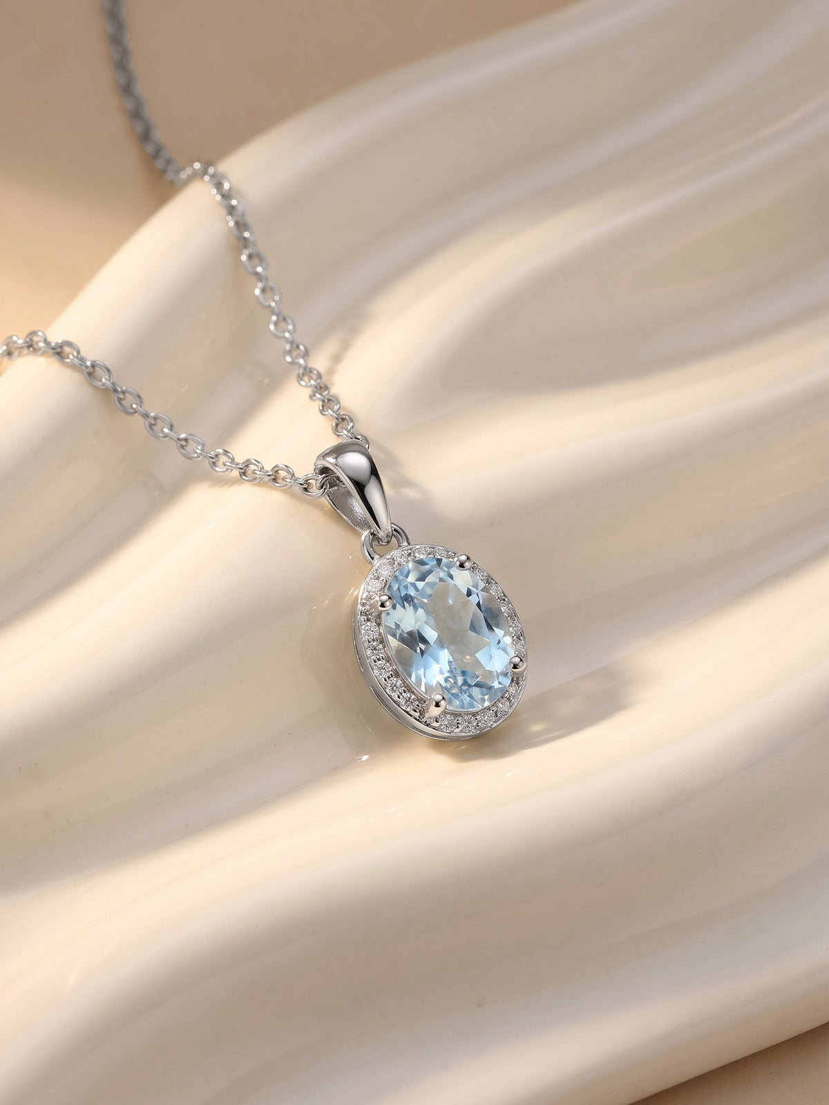 Silver Halo Blue Topaz Pendant With Link Chain