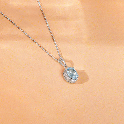 Silver Halo Blue Topaz Pendant With Link Chain