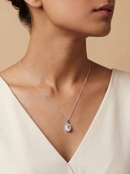Silver Halo Blue Topaz Pendant With Link Chain