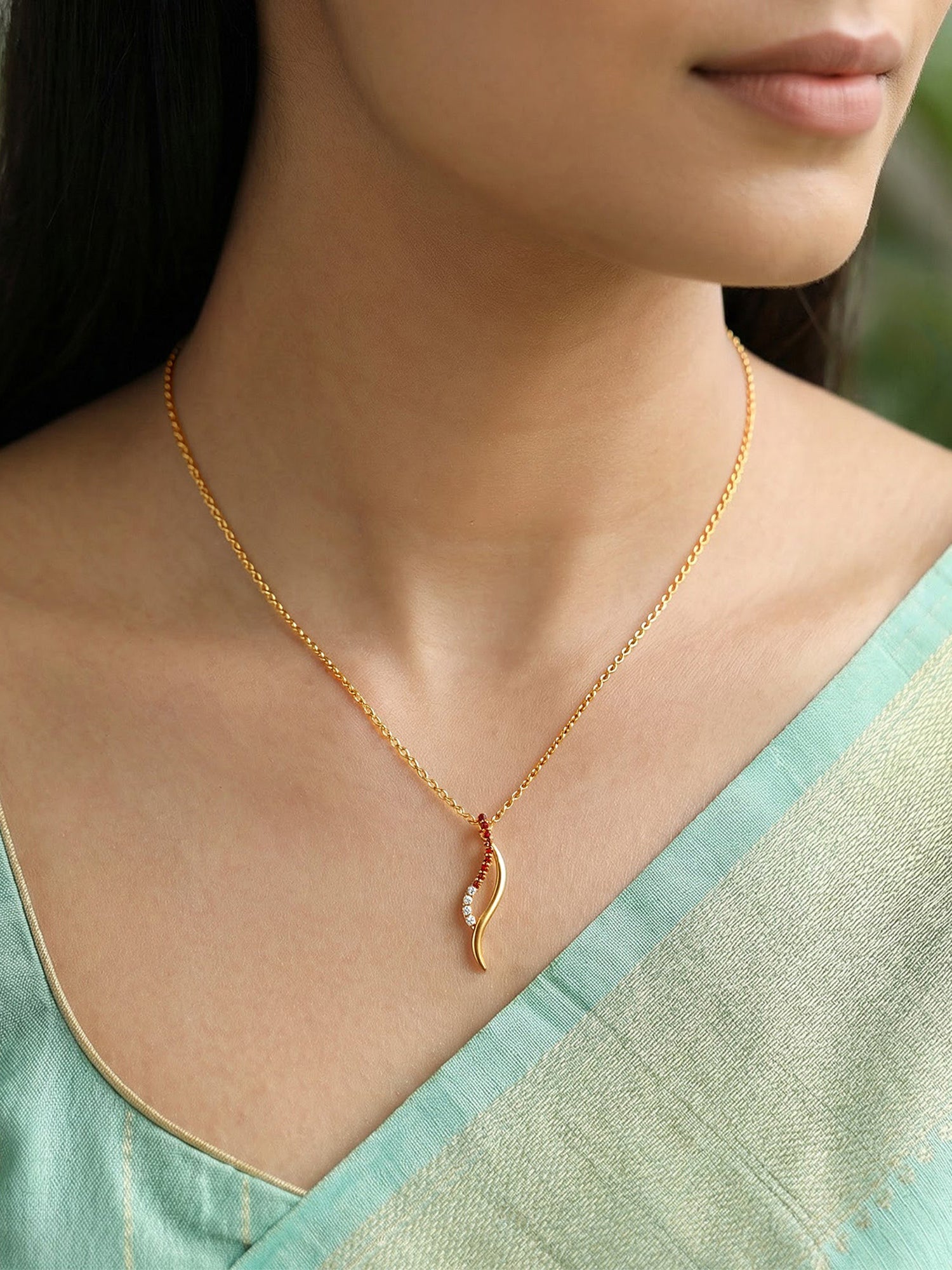 Golden Tanirika Pendant With Link Chain