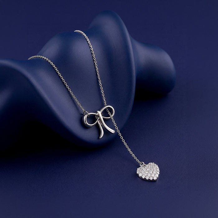 Silver Amora Bow and Heart Lariat Necklace