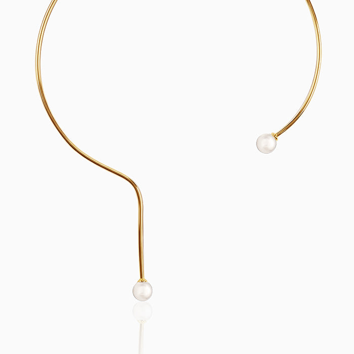"

Golden Gwyneth Pearl Hasli Necklace"