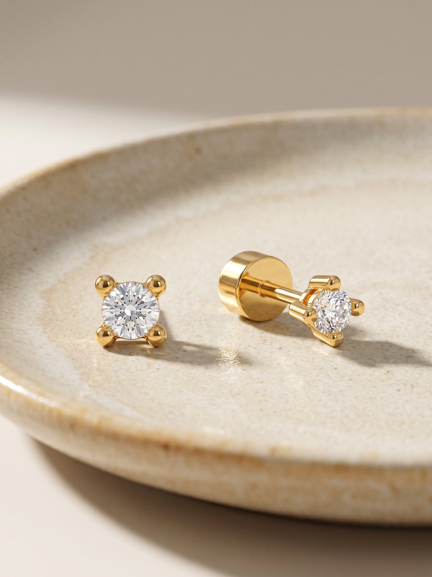 Golden Lian Ear Piercings