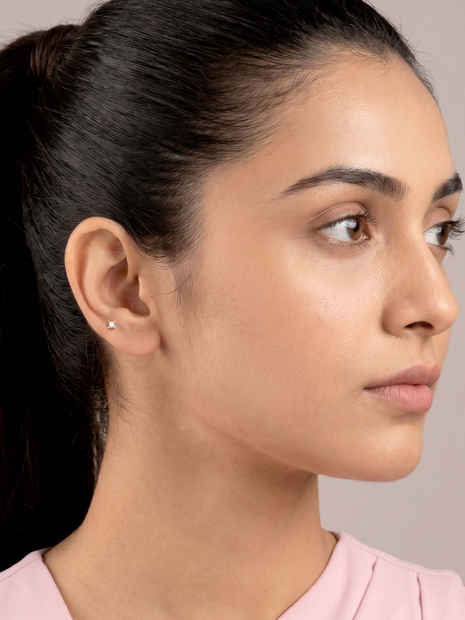 Golden Lian Ear Piercings