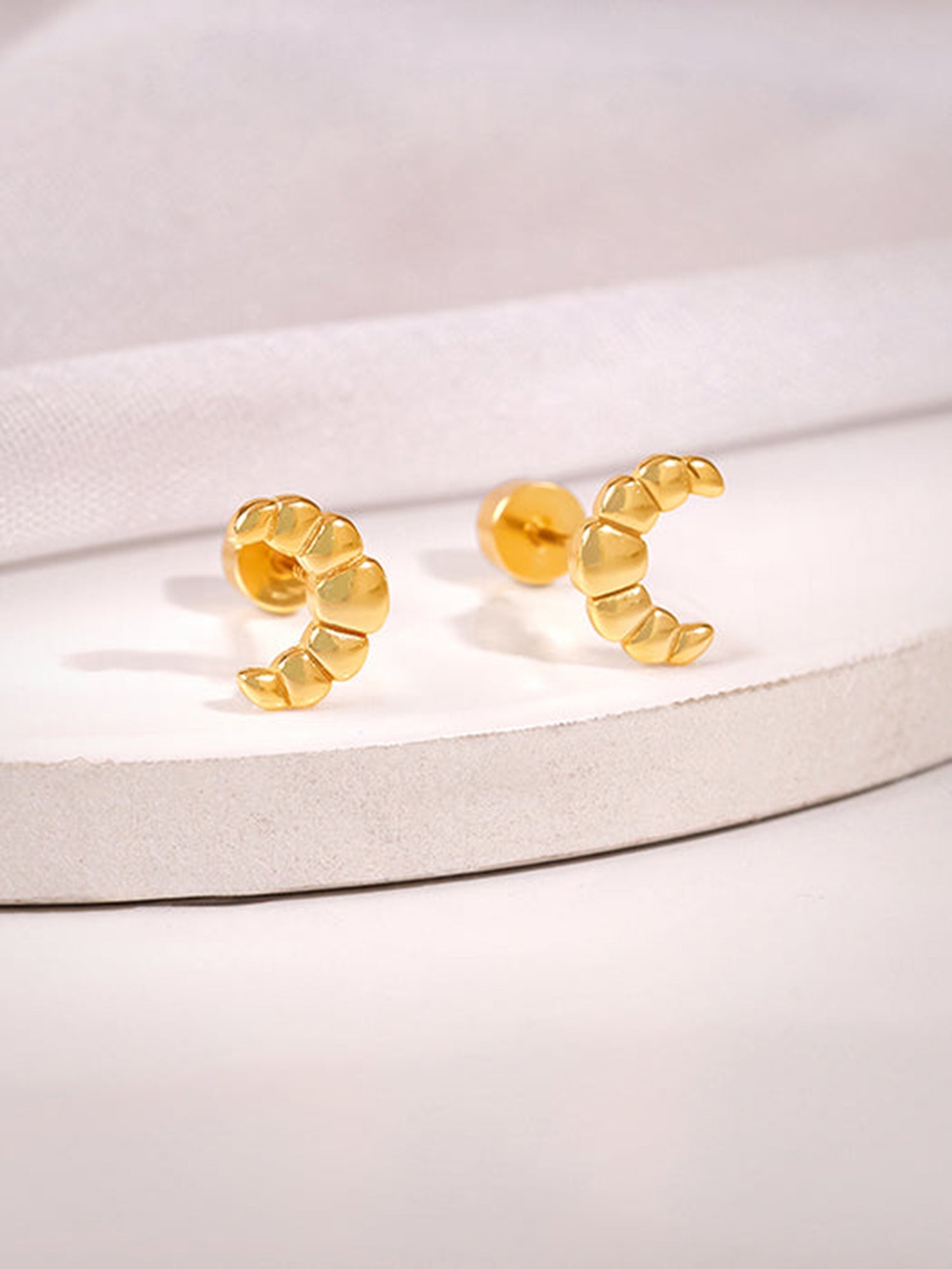 Golden Croissant Ear Piercings