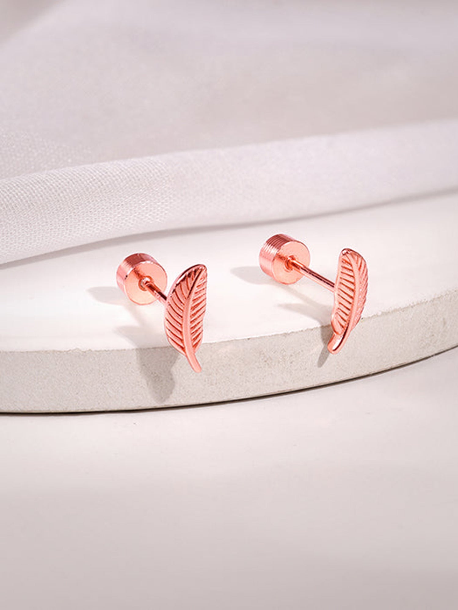 Rose Gold Liva Ear Piercings