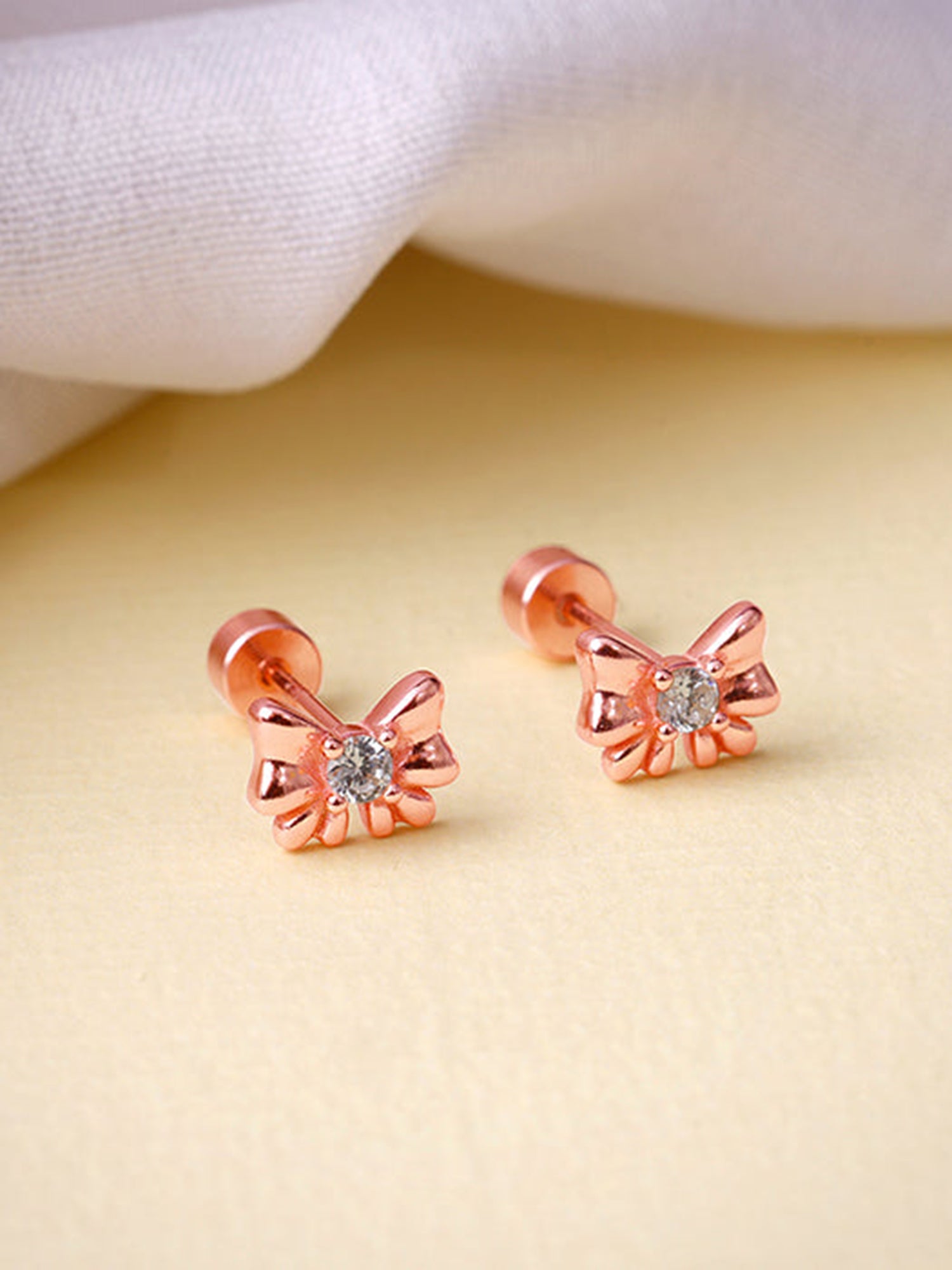 Rose Gold Bowie Ear Piercings