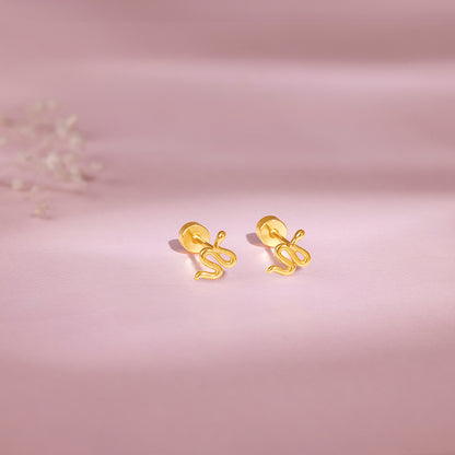Golden Medusa Ear Piercings