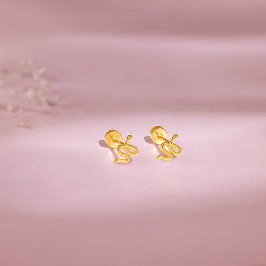 Golden Medusa Ear Piercings