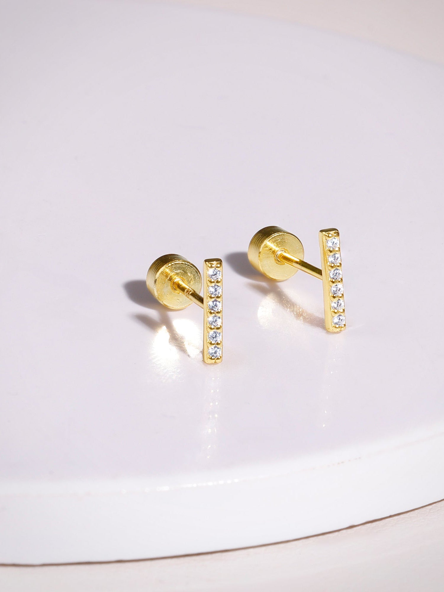Golden Bellus Ear Piercings