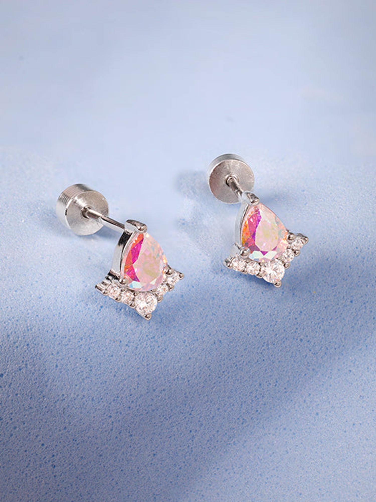 Silver Bellis Ear Piercings
