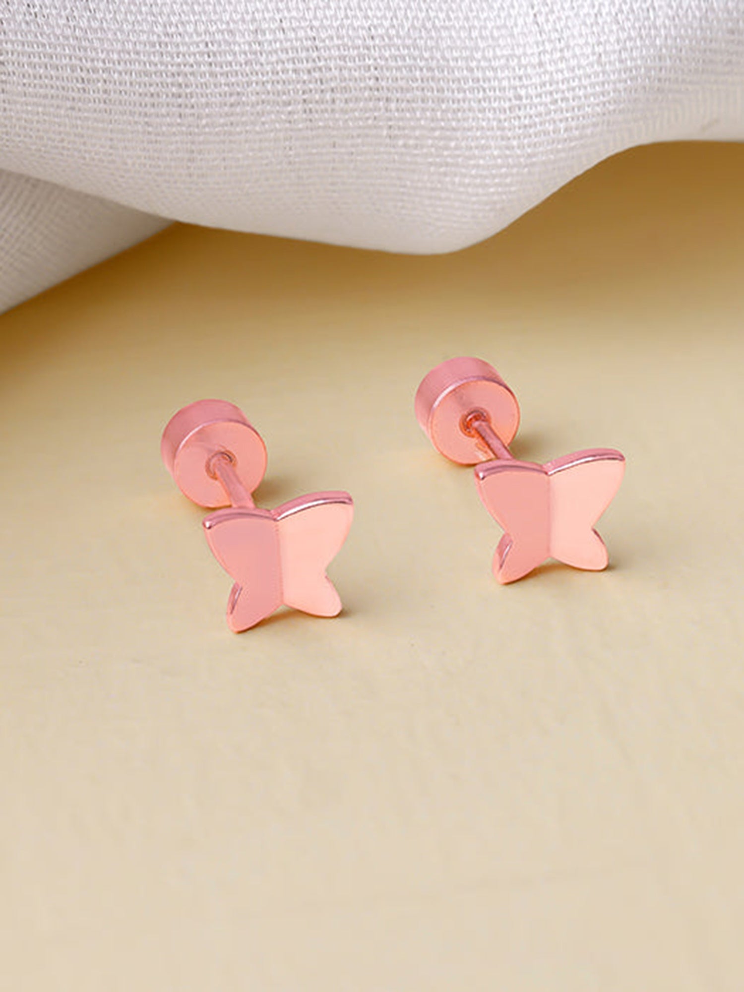 Rose Gold Fly Ear Piercings