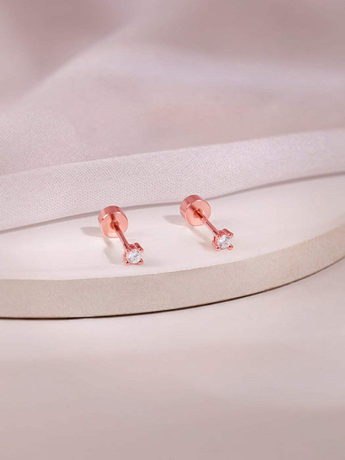 Rose Gold Flick Ear Piercings