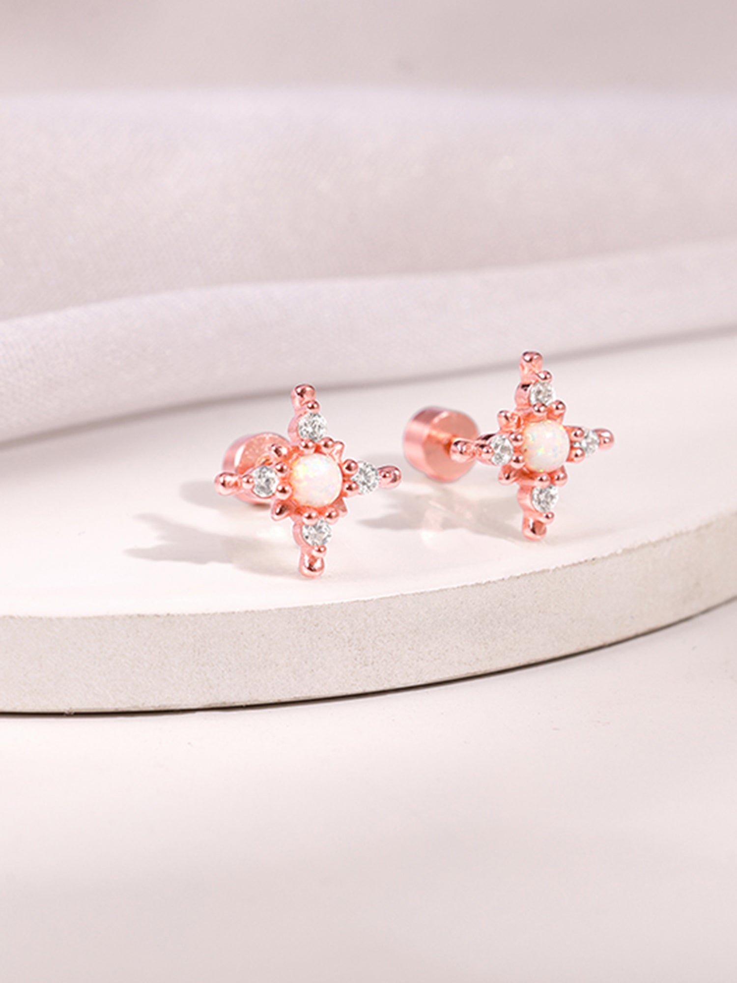 Rose Gold Looney Ear Piercings