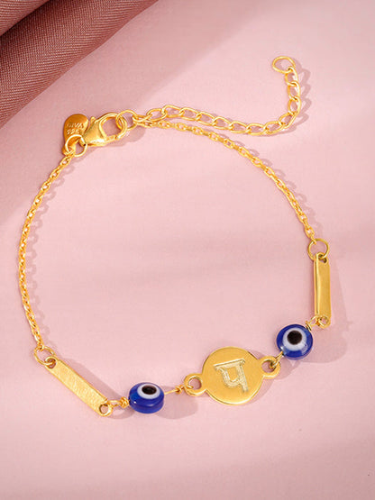 Golden Hindi Initial Evil Eye Bracelet