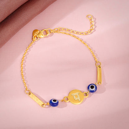 Golden Hindi Initial Evil Eye Bracelet