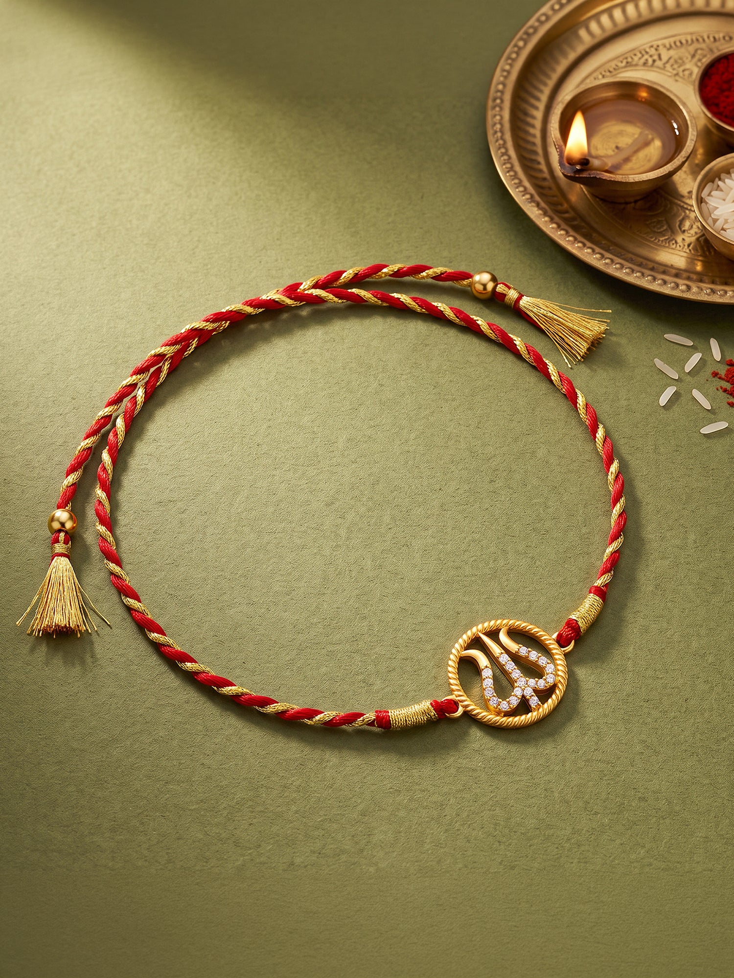 Golden Divine Trishula Rakhi